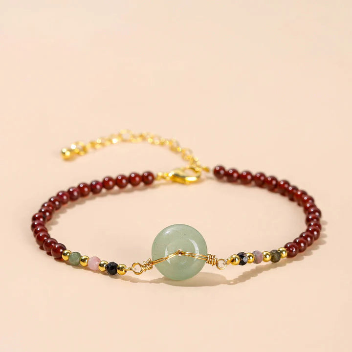 Pulseira Roda da Proteção em Granada Natural