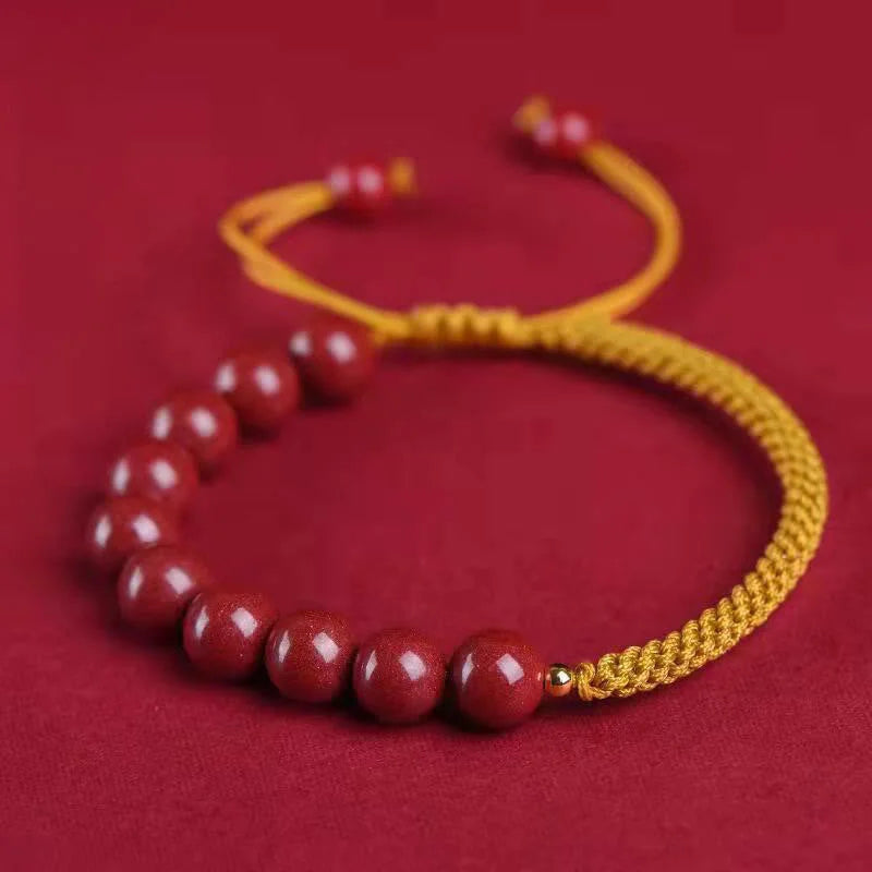 Pulseira Tibetana Amarela com Contas de Cinábrio