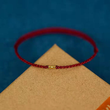 Pulseira Trançada com Contas Douradas da Sorte