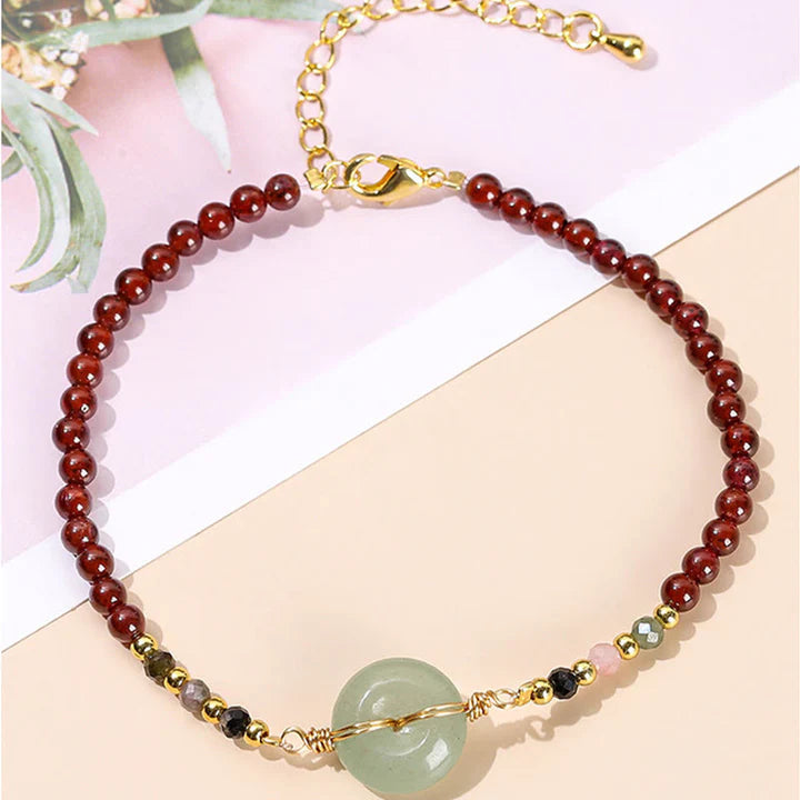 Pulseira Roda da Proteção em Granada Natural