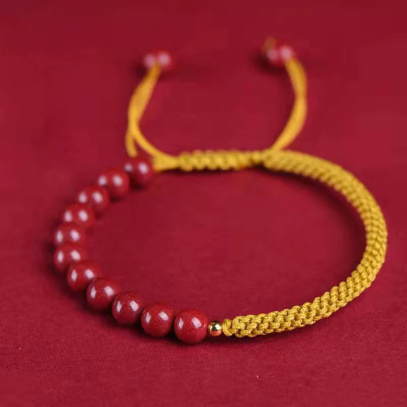 Pulseira Tibetana Amarela com Contas de Cinábrio