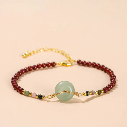 Pulseira Roda da Proteção em Granada Natural