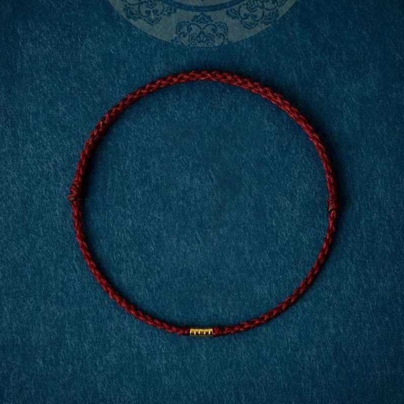 Pulseira Trançada com Contas Douradas da Sorte