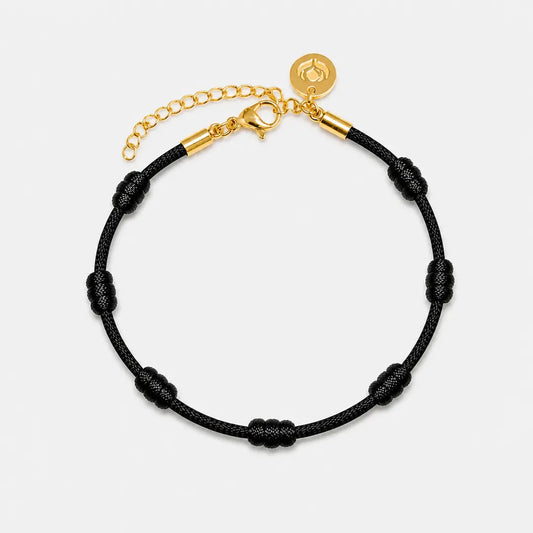 Pulseira Premium dos 7 Nós Preta com Dourado