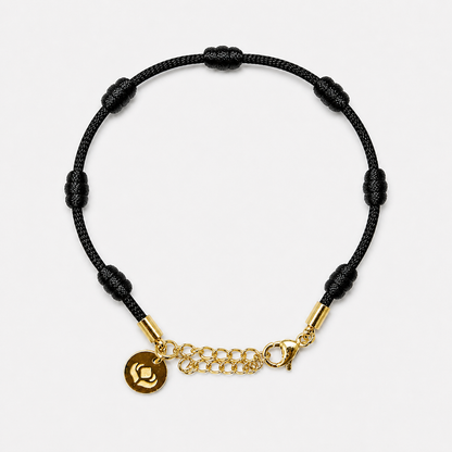 Pulseira Premium dos 7 Nós preta com dourado