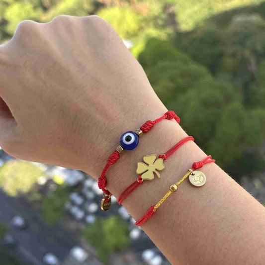 Oferta: Compre 1 Pulseira Da Kabbalah Contra Olho Gordo + 1 Pulseira da Sorte em Trevo e ganhe 1 Pulseira Conta Dourada