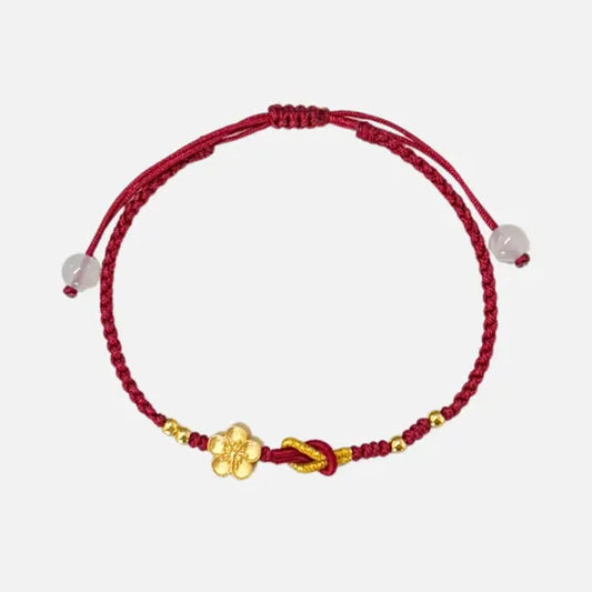 Pulseira Vermelha Flor de Cerejeira da Renovação