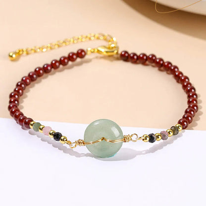 Pulseira Roda da Proteção em Granada Natural