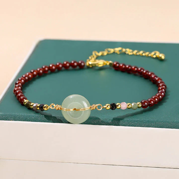 Pulseira Roda da Proteção em Granada Natural