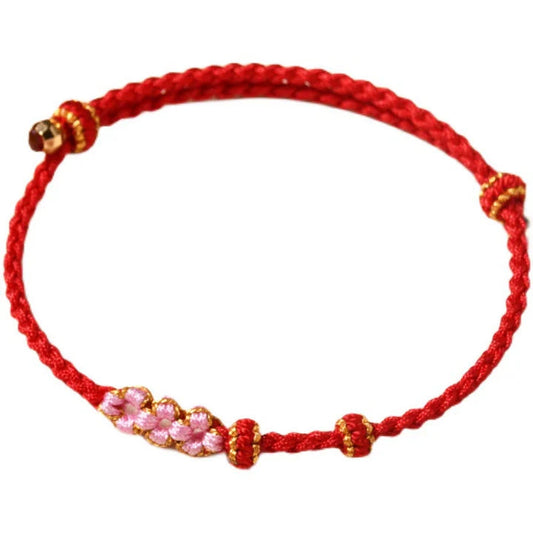 Pulseira Flor de Pêssego Trançada da Proteção