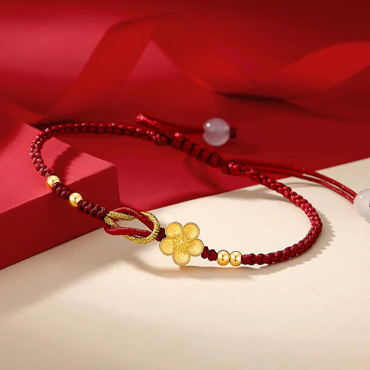Pulseira Vermelha Flor de Cerejeira da Renovação