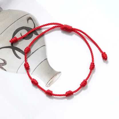 Kit 10 Pulseiras dos 7 Nós — detalhe