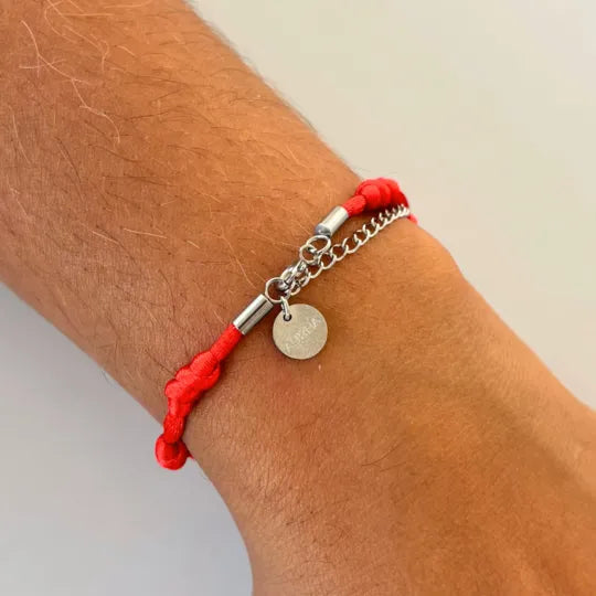 Compre 3 e Leve 5 Pulseiras Premium dos 7 Nós em Aço Inoxidável — no pulso