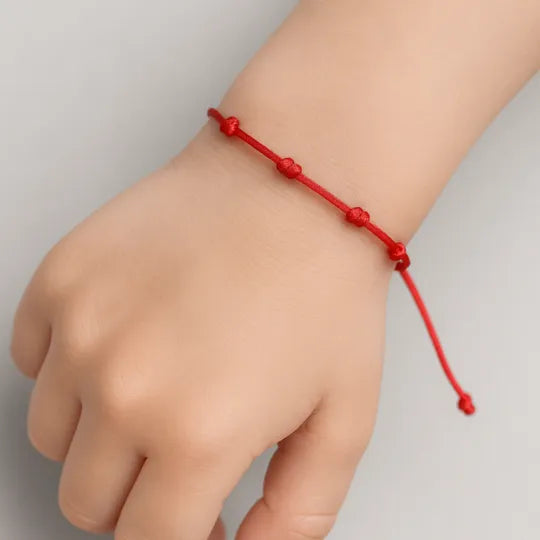Pulseira Premium dos 7 Nós para Crianças — no pulso
