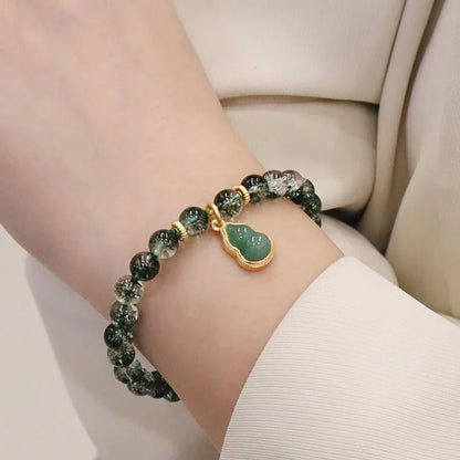 Pulseira Fantasma Verde da Autoaceitação — no pulso