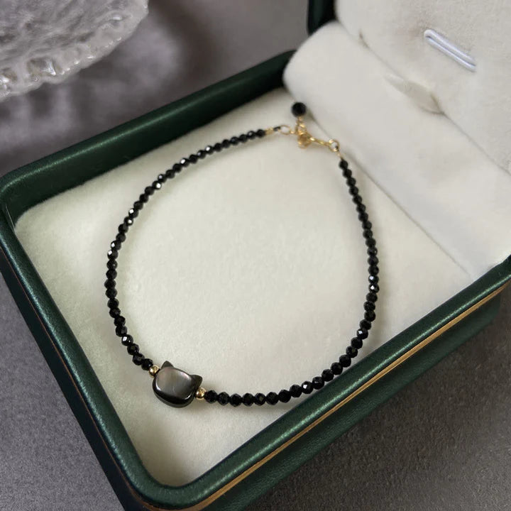 Pulseira Gato da Cura — embalagem