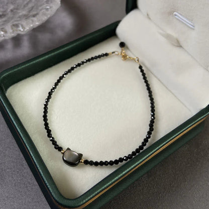 Pulseira Gato da Cura — embalagem
