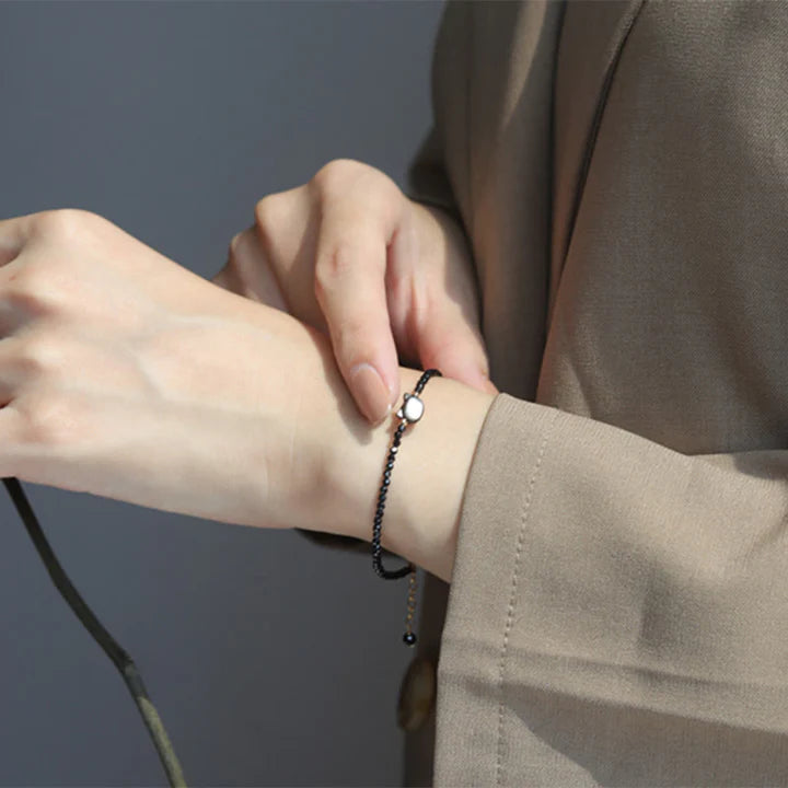 Pulseira Gato da Cura — no pulso