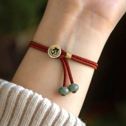 Pulseira Tibetana da Proteção — no pulso