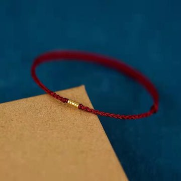 Pulseira Trançada com Contas Douradas da Sorte - Aurha