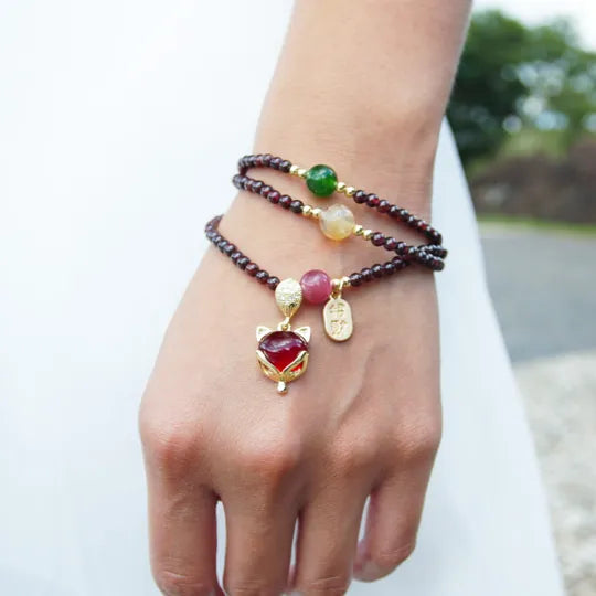 Pulseira Tripla Fortuna — no pulso