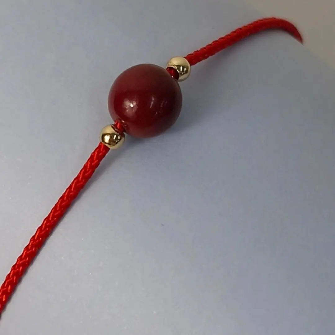 Pulseira Vermelha da Concentração — detalhe