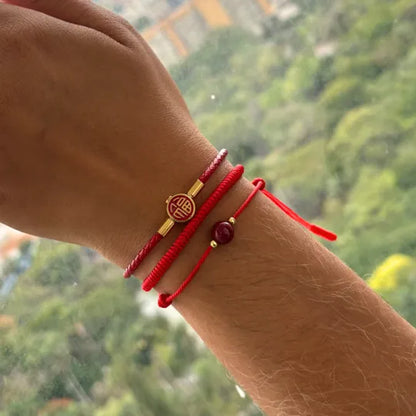 Pulseira Vermelha da Concentração — no pulso