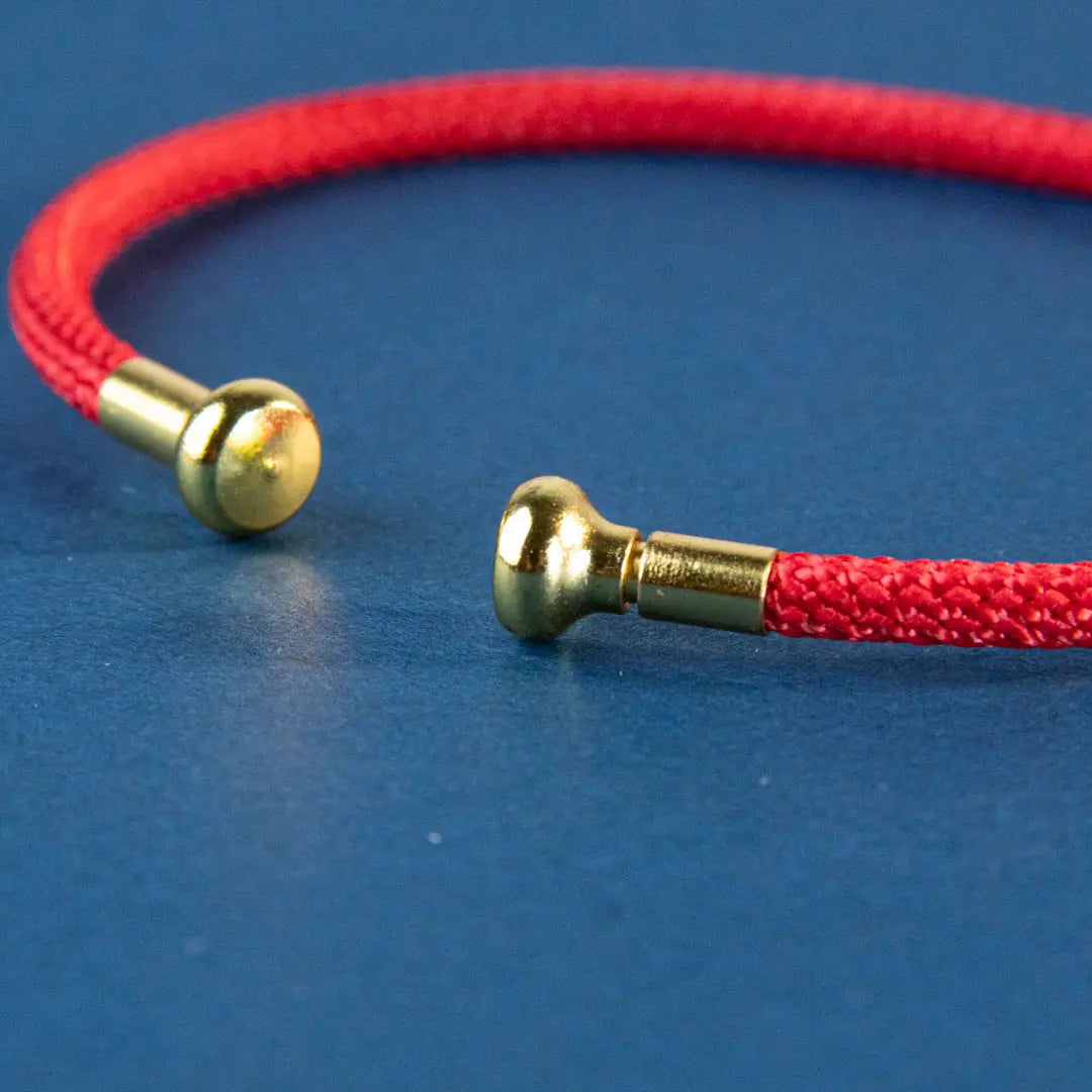 Pulseira Vermelha da Conexão — detalhe