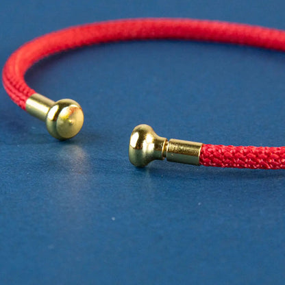 Pulseira Vermelha da Conexão — detalhe